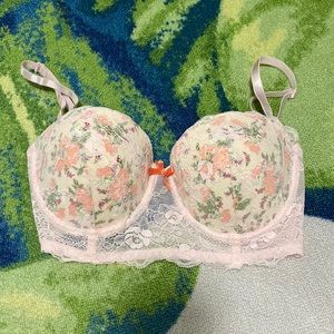Pink lace bra with flower under lace cups